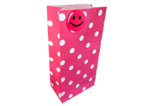 Pink polka dot bag with sticker
