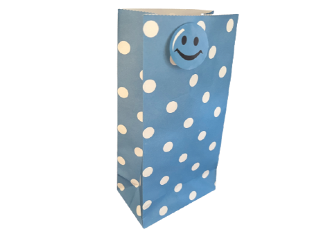 Blue polka dot bag with sticker